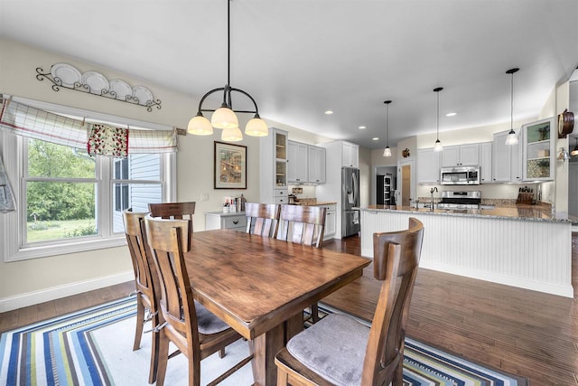 5119 Reynolds Ave, Waunakee, WI 53597 - dining area featuring dark wood-style flooring, baseboards, and recessed lighting