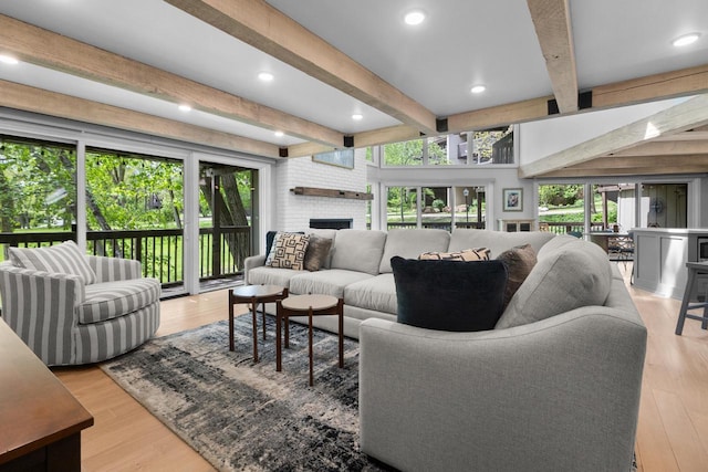 845 Hillside Dr Unit G4, Fontana, WI 53125 - living area featuring beam ceiling, light wood-style flooring, a fireplace, and recessed lighting