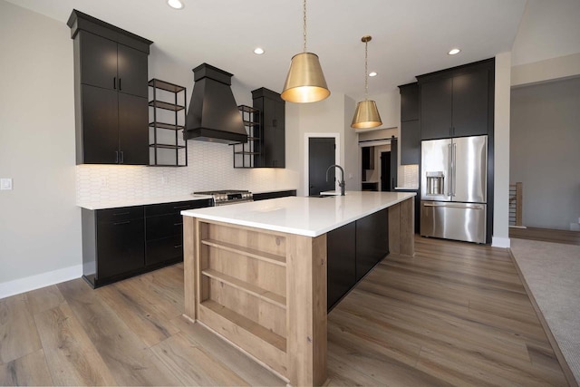624 Green Bay Rd, Thiensville, WI 53092 - kitchen with stainless steel appliances, custom exhaust hood, a sink, dark cabinets, and tasteful backsplash