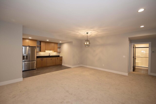 624 Green Bay Rd, Thiensville, WI 53092 - unfurnished living room featuring carpet flooring, baseboards, recessed lighting, and a chandelier