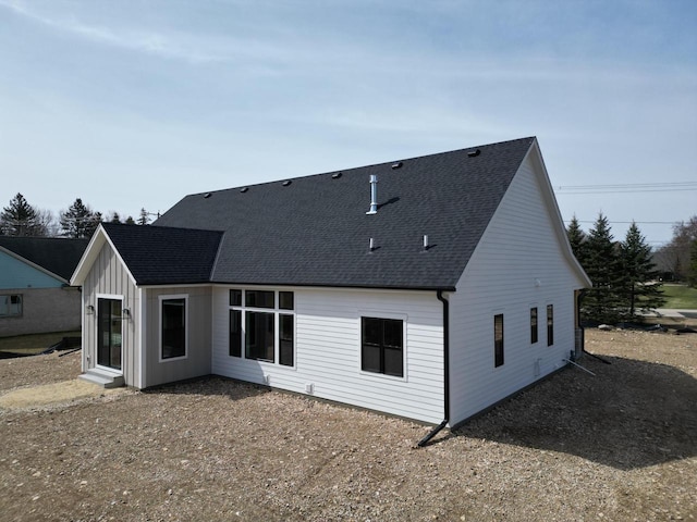 624 Green Bay Rd, Thiensville, WI 53092 - rear view of house featuring a shingled roof