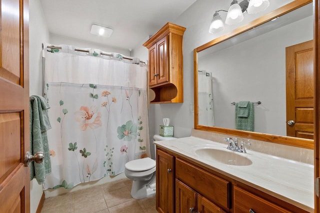 1603 Pine Tree Ln, Luxemburg, WI 54217 - bathroom with vanity, toilet, and tile patterned floors