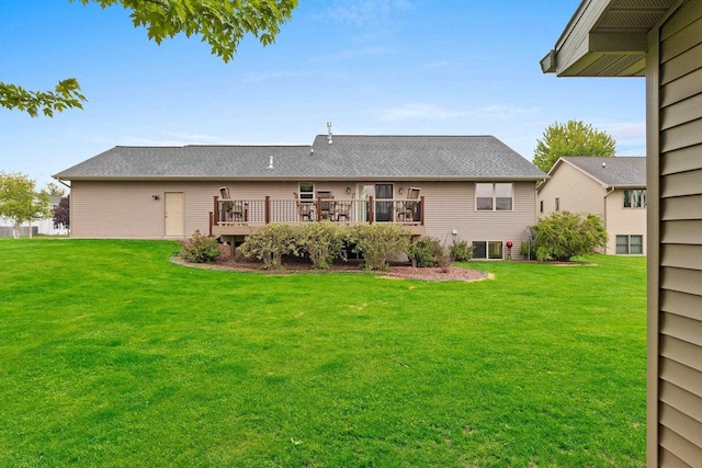 1603 Pine Tree Ln, Luxemburg, WI 54217 - rear view of property featuring a yard and a deck