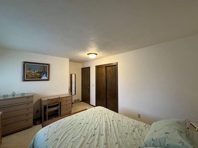 137 24th Ave, Monroe, WI 53566 - bedroom with light carpet and two closets