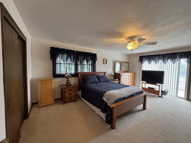 137 24th Ave, Monroe, WI 53566 - bedroom with light carpet and a ceiling fan