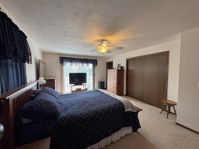 137 24th Ave, Monroe, WI 53566 - bedroom with carpet flooring, a ceiling fan, and a closet