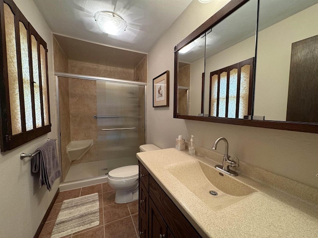 137 24th Ave, Monroe, WI 53566 - full bath with toilet, vanity, a shower stall, and tile patterned floors