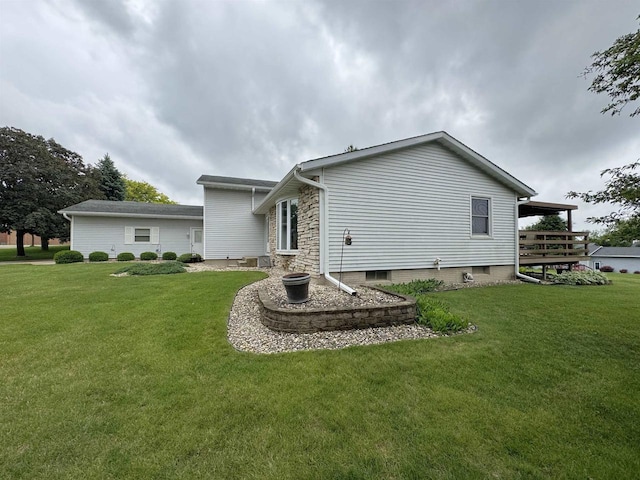 137 24th Ave, Monroe, WI 53566 - back of property featuring a lawn
