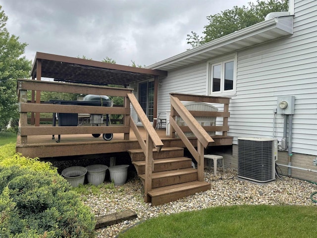 137 24th Ave, Monroe, WI 53566 - wooden terrace featuring central AC and stairway