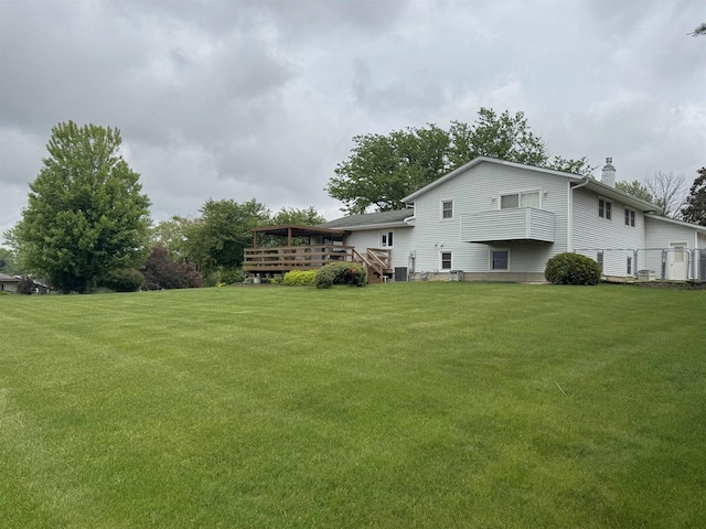 137 24th Ave, Monroe, WI 53566 - view of grassy yard featuring a deck and central AC
