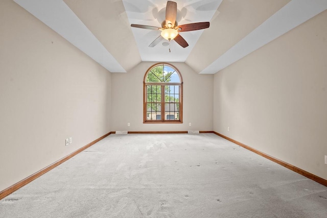 209 E Timberline Dr, Appleton, WI 54913 - spare room featuring baseboards, a ceiling fan, carpet floors, and vaulted ceiling