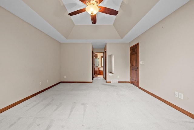 209 E Timberline Dr, Appleton, WI 54913 - carpeted empty room featuring a tray ceiling, a ceiling fan, and baseboards
