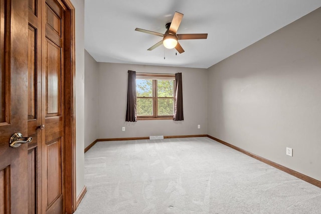 209 E Timberline Dr, Appleton, WI 54913 - empty room with light carpet, a ceiling fan, and baseboards