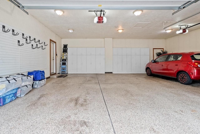 209 E Timberline Dr, Appleton, WI 54913 - garage featuring a garage door opener