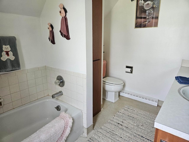 7310 Old 57 Rd, Greenleaf, WI 54126 - full bathroom featuring vanity, baseboard heating, toilet, a bath, and baseboards