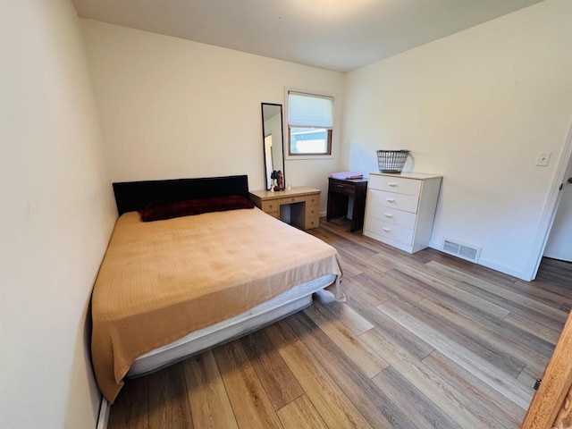 1120 4th St, Baraboo, WI 53913 - bedroom with light wood-style floors