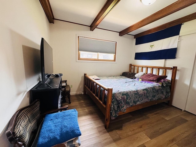 1120 4th St, Baraboo, WI 53913 - bedroom featuring wood finished floors and beamed ceiling