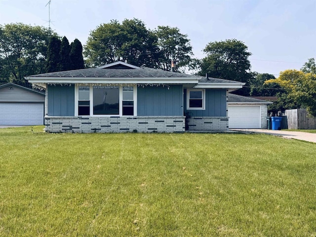 1120 4th St, Baraboo, WI 53913 - view of front of house featuring board and batten siding, a front lawn, and roof with shingles