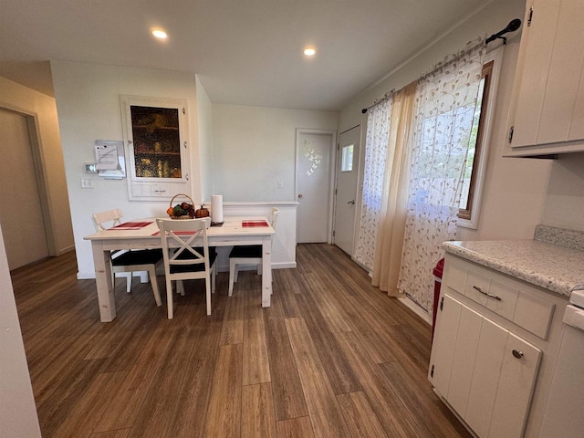 1120 4th St, Baraboo, WI 53913 - dining area with dark wood-style floors and recessed lighting