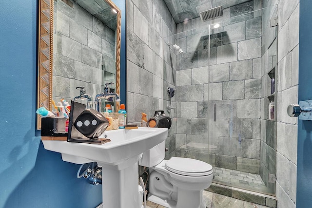 2505 N Oakland Ave Unit 2507, Milwaukee, WI 53211 - bathroom featuring a stall shower and toilet