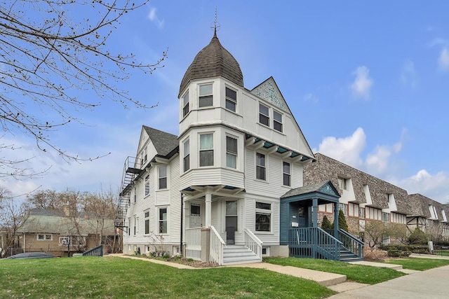 2505 N Oakland Ave Unit 2507, Milwaukee, WI 53211 - victorian home with a front lawn