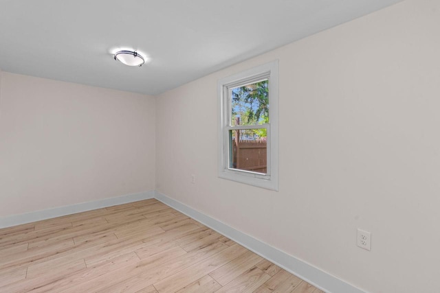 603 Spring St, Lake Geneva, WI 53147 - unfurnished room featuring light wood finished floors and baseboards