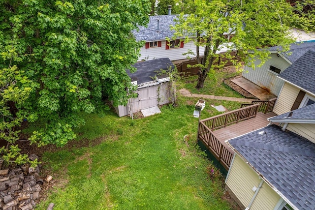 603 Spring St, Lake Geneva, WI 53147 - view of grassy yard with a deck