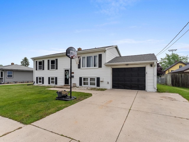 1801 S 24th St, Manitowoc, WI 54220 - raised ranch with an attached garage and concrete driveway