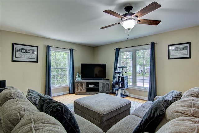 1805 Main St, Eau Claire, WI 54701 - living room with ceiling fan, wood finished floors, and baseboards