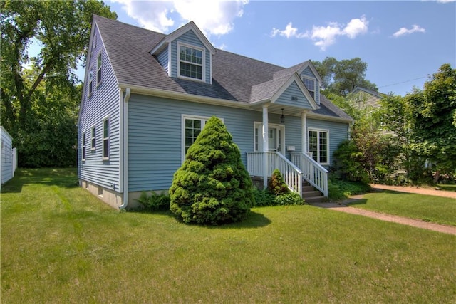 1805 Main St, Eau Claire, WI 54701 - new england style home with a front yard and a shingled roof