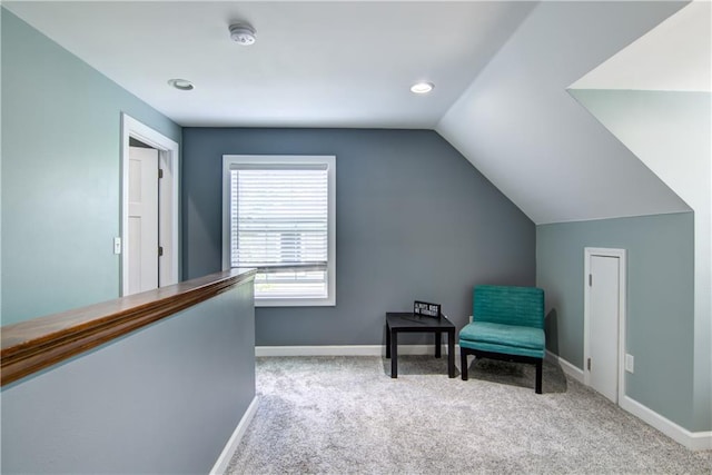 1805 Main St, Eau Claire, WI 54701 - living area with carpet floors, lofted ceiling, baseboards, and recessed lighting