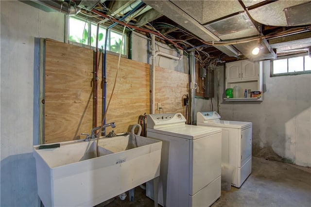 1805 Main St, Eau Claire, WI 54701 - laundry room with independent washer and dryer and cabinet space