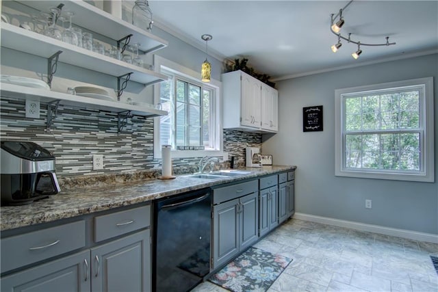 1805 Main St, Eau Claire, WI 54701 - kitchen featuring dishwasher, a sink, crown molding, decorative backsplash, and baseboards