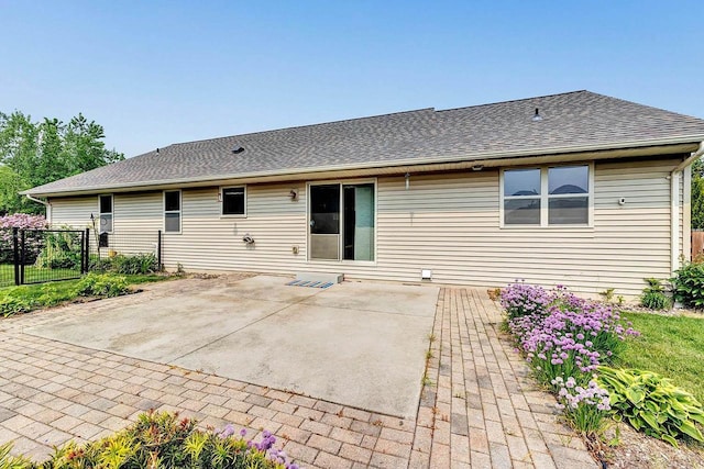 3251 Bower Creek Rd, De Pere, WI 54115 - rear view of property with a patio area and roof with shingles