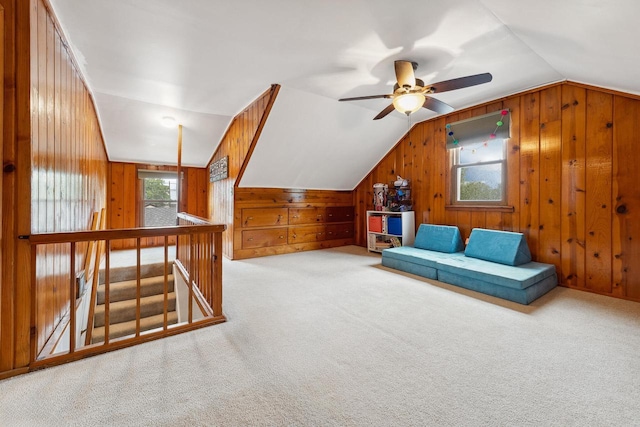 2602 26th St, South Street, La Crosse, WI 54601 - additional living space featuring lofted ceiling, wooden walls, carpet, and a ceiling fan