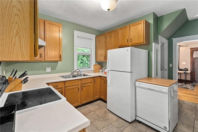 1528 Bellevue Ave, Eau Claire, WI 54703 - kitchen featuring a sink, white appliances, and light countertops