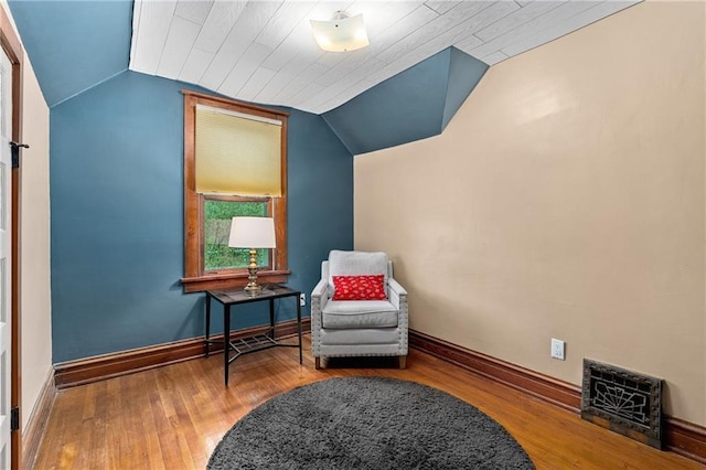 1528 Bellevue Ave, Eau Claire, WI 54703 - sitting room with lofted ceiling, wood finished floors, and baseboards