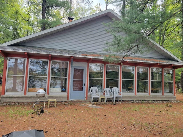 N9225 Sumac Ln, Gresham, WI 54128 - back of house with a sunroom