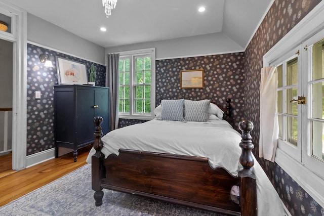 234 Warren St, Lake Geneva, WI 53147 - bedroom with wallpapered walls, wood finished floors, baseboards, vaulted ceiling, and recessed lighting