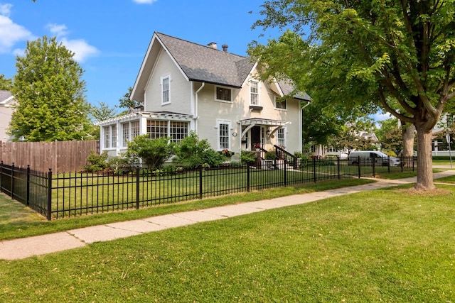 234 Warren St, Lake Geneva, WI 53147 - view of front of house with a shingled roof and a chimney