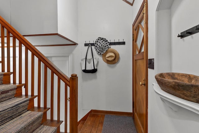 234 Warren St, Lake Geneva, WI 53147 - staircase with wood-type flooring