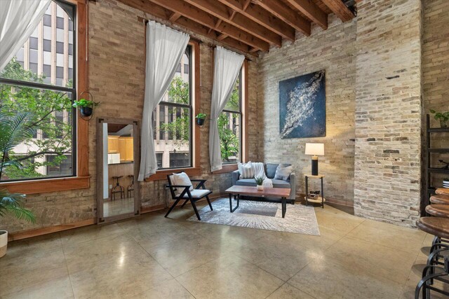 771 N Water St Unit 25, Milwaukee, WI 53202 - sitting room with a towering ceiling and concrete floors