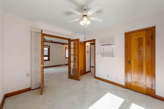 2147 S 90th St, West Allis, WI 53227 - unfurnished bedroom featuring light colored carpet, baseboards, and ceiling fan