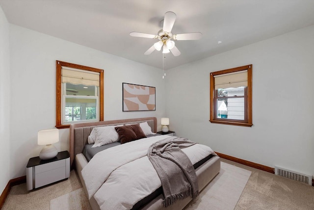 2147 S 90th St, West Allis, WI 53227 - bedroom featuring light colored carpet, baseboards, and ceiling fan