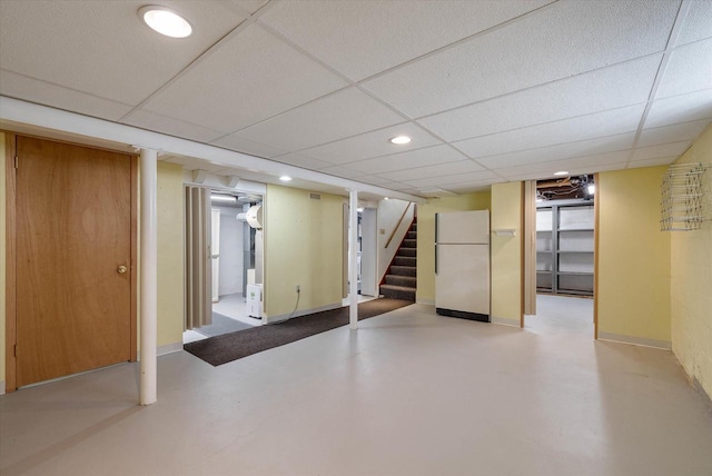 2147 S 90th St, West Allis, WI 53227 - finished basement with freestanding refrigerator, stairway, recessed lighting, and a drop ceiling