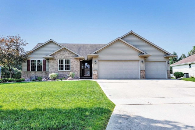 3611 Glen Kent Ct, Green Bay, WI 54313 - ranch-style home featuring brick siding, an attached garage, driveway, and a front lawn