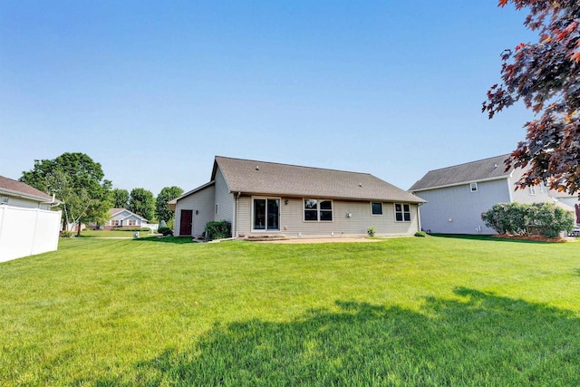 3611 Glen Kent Ct, Green Bay, WI 54313 - back of house featuring a lawn
