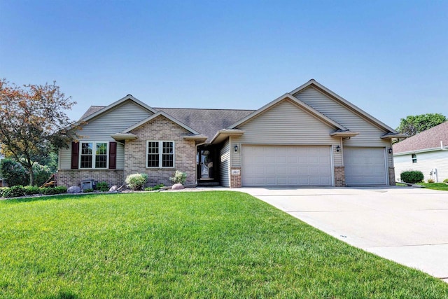 3611 Glen Kent Ct, Green Bay, WI 54313 - view of front of property with brick siding, an attached garage, and driveway