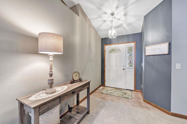 3611 Glen Kent Ct, Green Bay, WI 54313 - entrance foyer featuring baseboards, light tile patterned floors, and light carpet