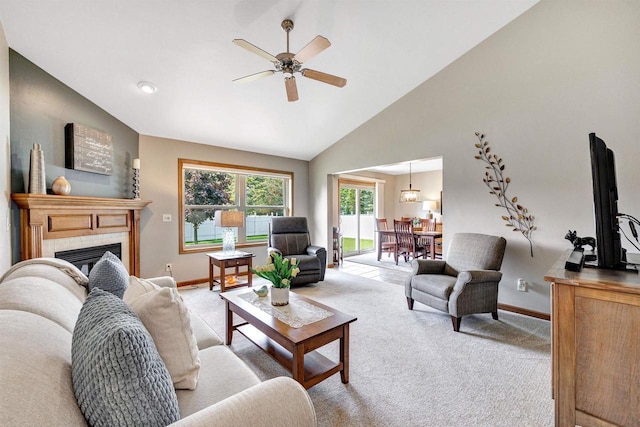 3611 Glen Kent Ct, Green Bay, WI 54313 - living area with light colored carpet, a ceiling fan, baseboards, a fireplace, and lofted ceiling